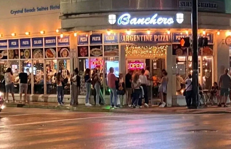 Pizza restaurant queue scene